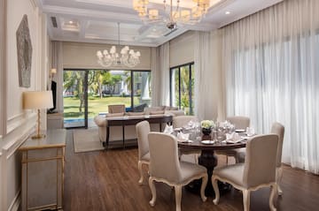 a room with a table and chairs