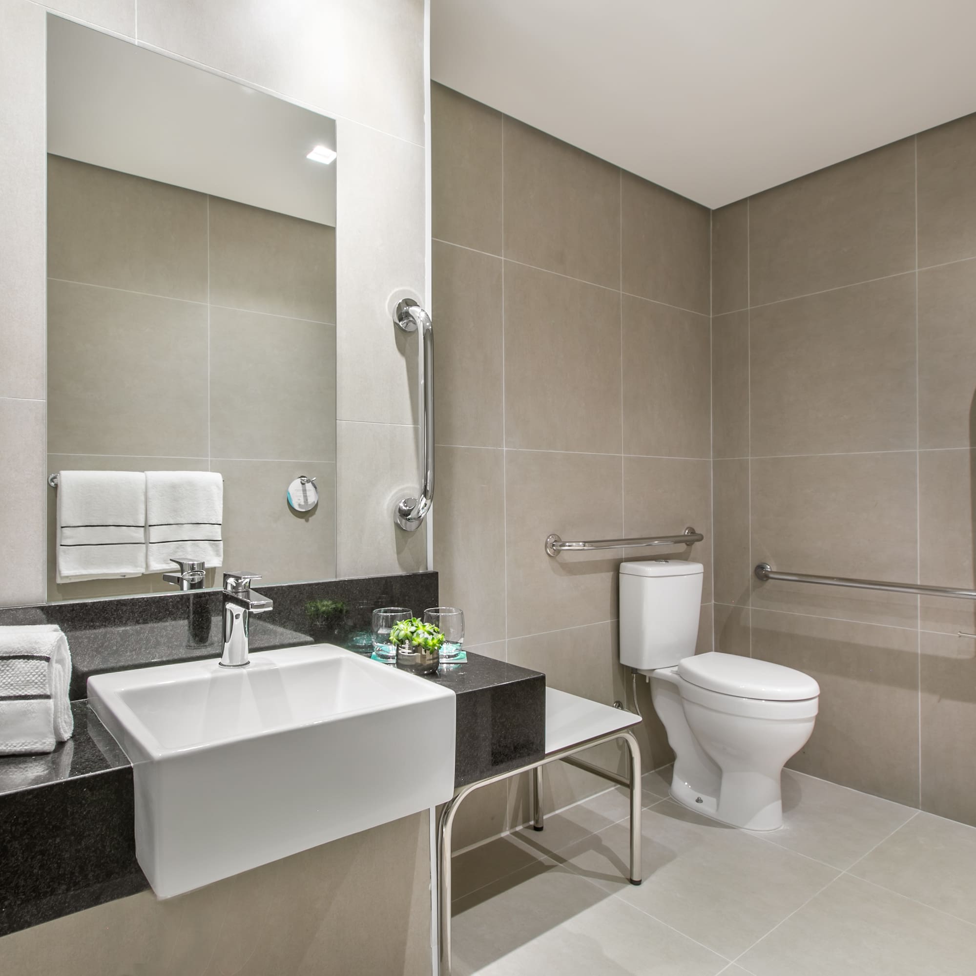 a bathroom with a sink and toilet