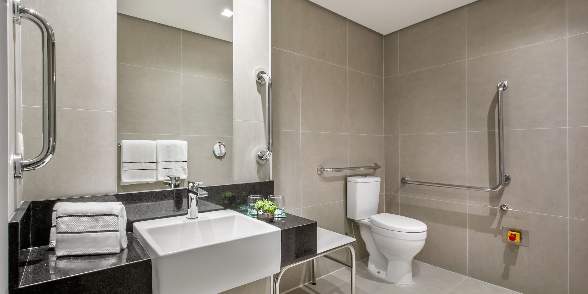 a bathroom with a sink and toilet