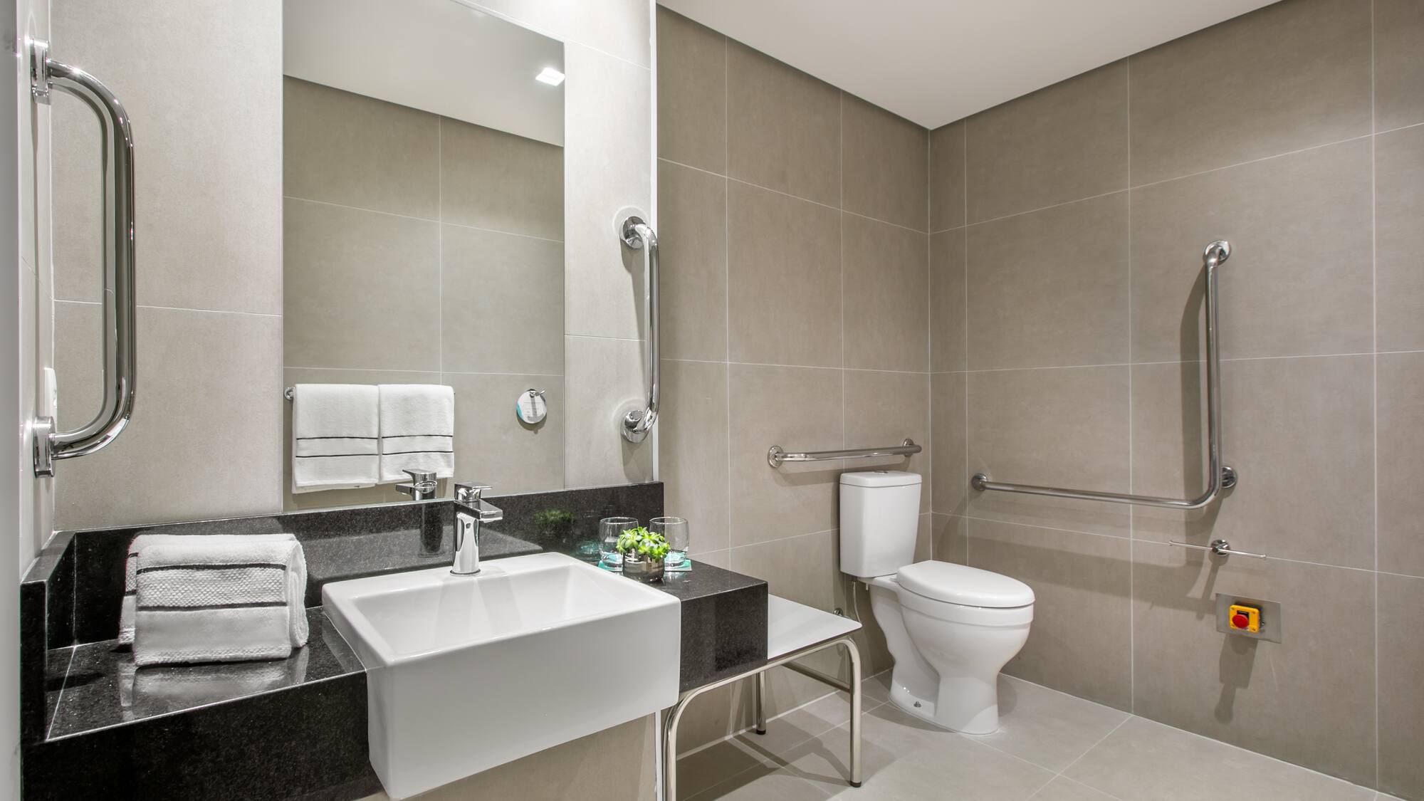 a bathroom with a sink and toilet