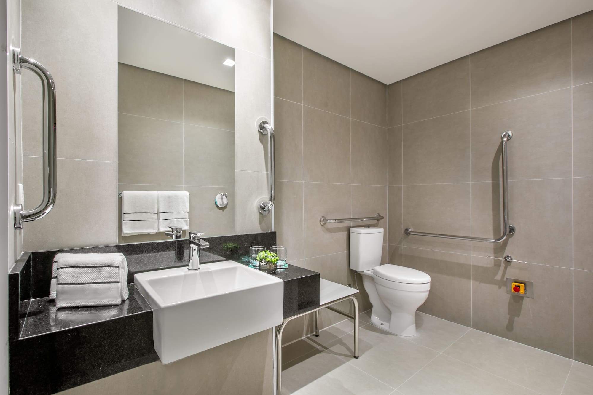 a bathroom with a sink and toilet