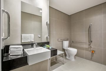 a bathroom with a sink and toilet