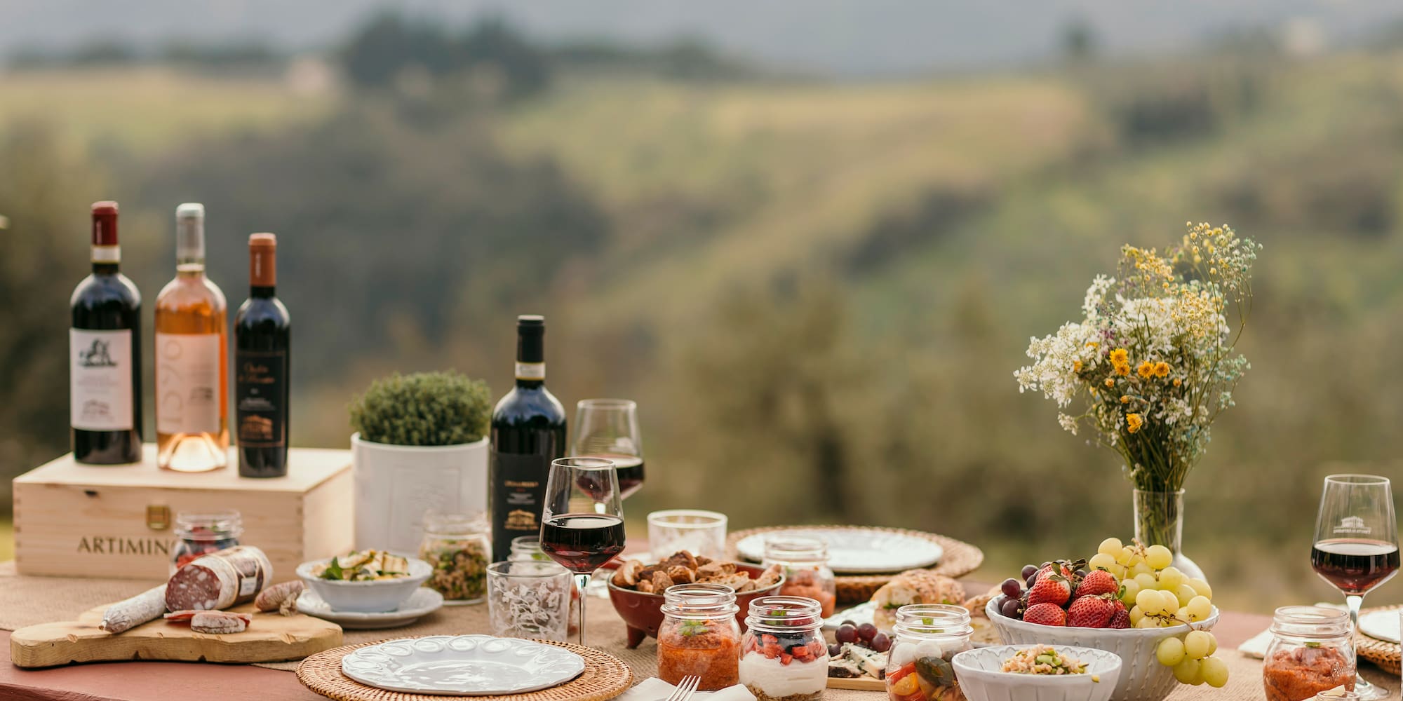 a table with food and wine on it
