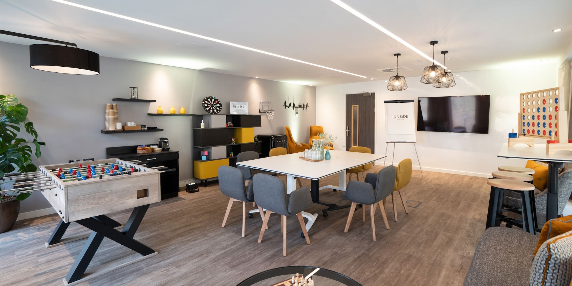 a room with a table and chairs