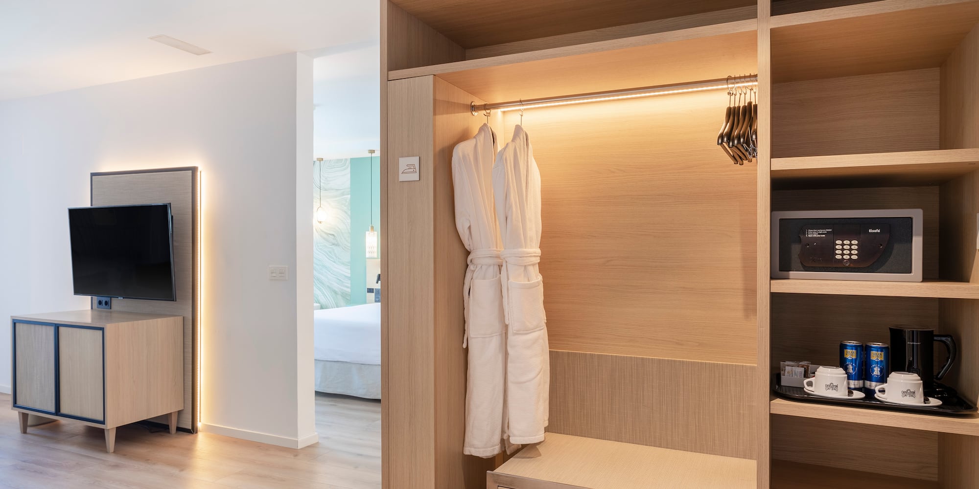 a room with a closet and a tv