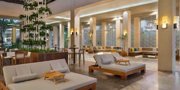 a large room with couches and tables