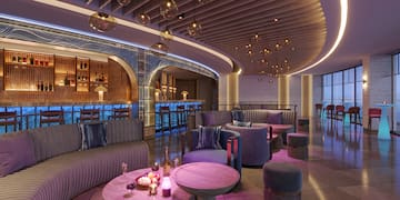 a room with a table and chairs