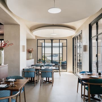 a room with tables and chairs