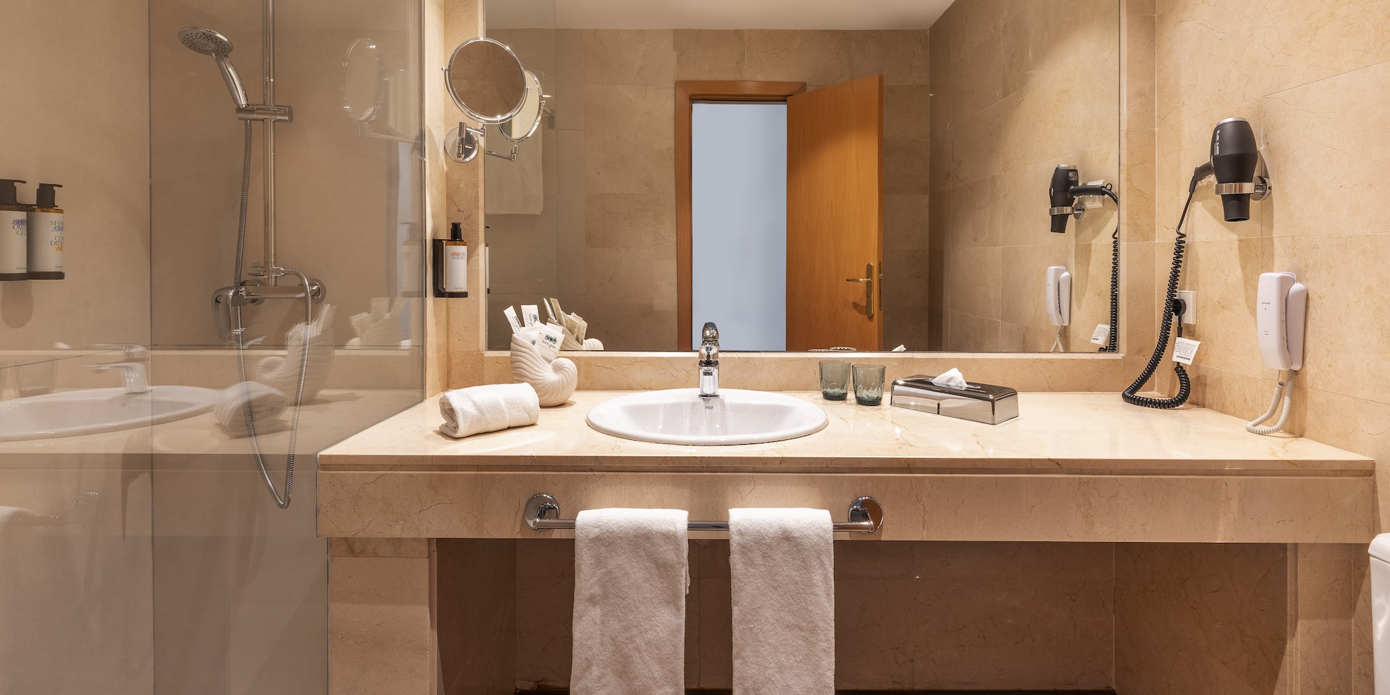 a bathroom with a mirror and sink