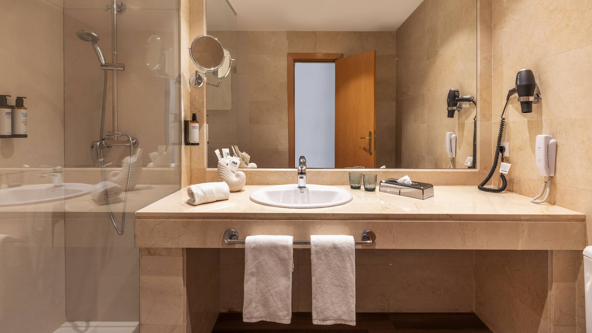 a bathroom with a mirror and sink