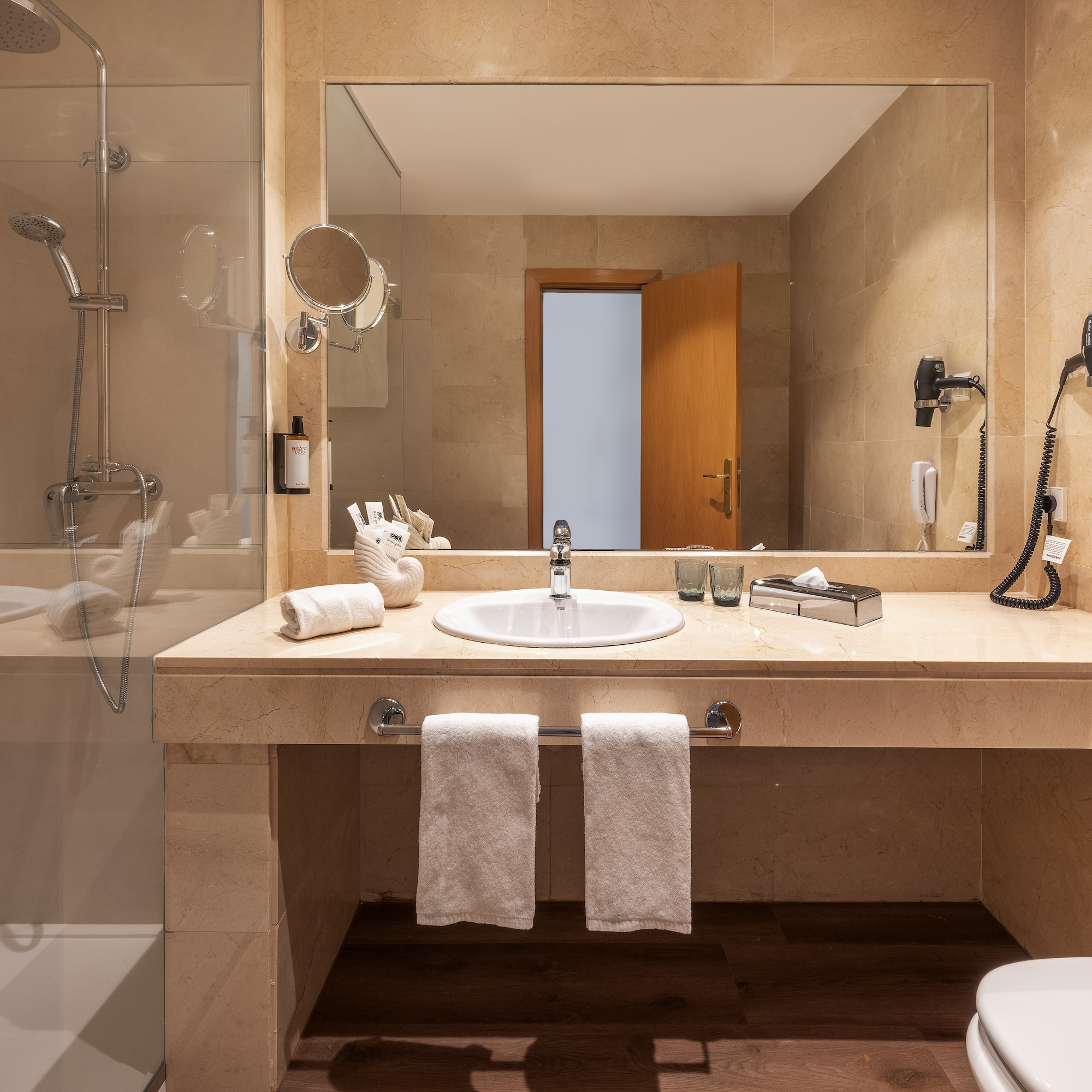 a bathroom with a mirror and sink