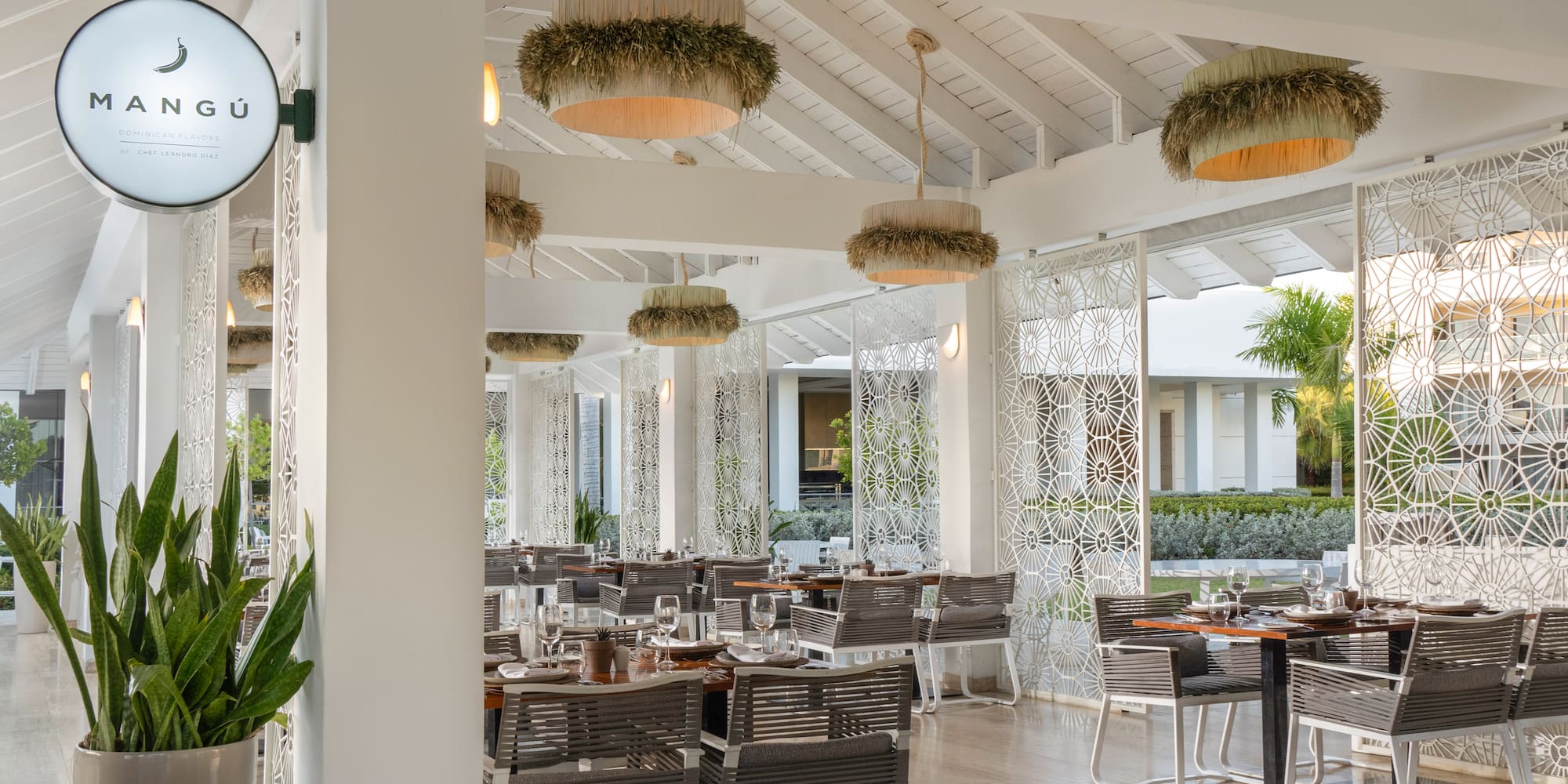 a restaurant with tables and chairs