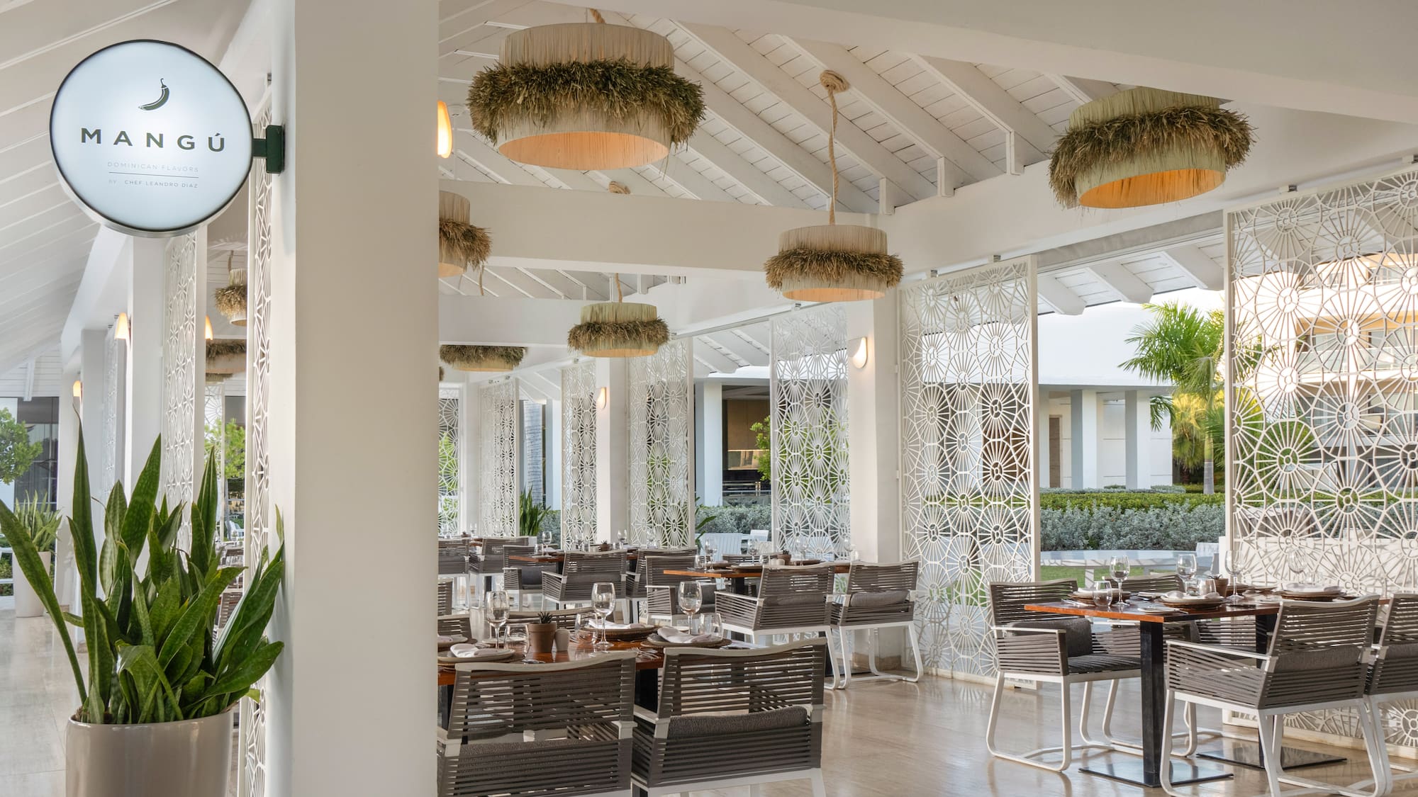 a restaurant with tables and chairs