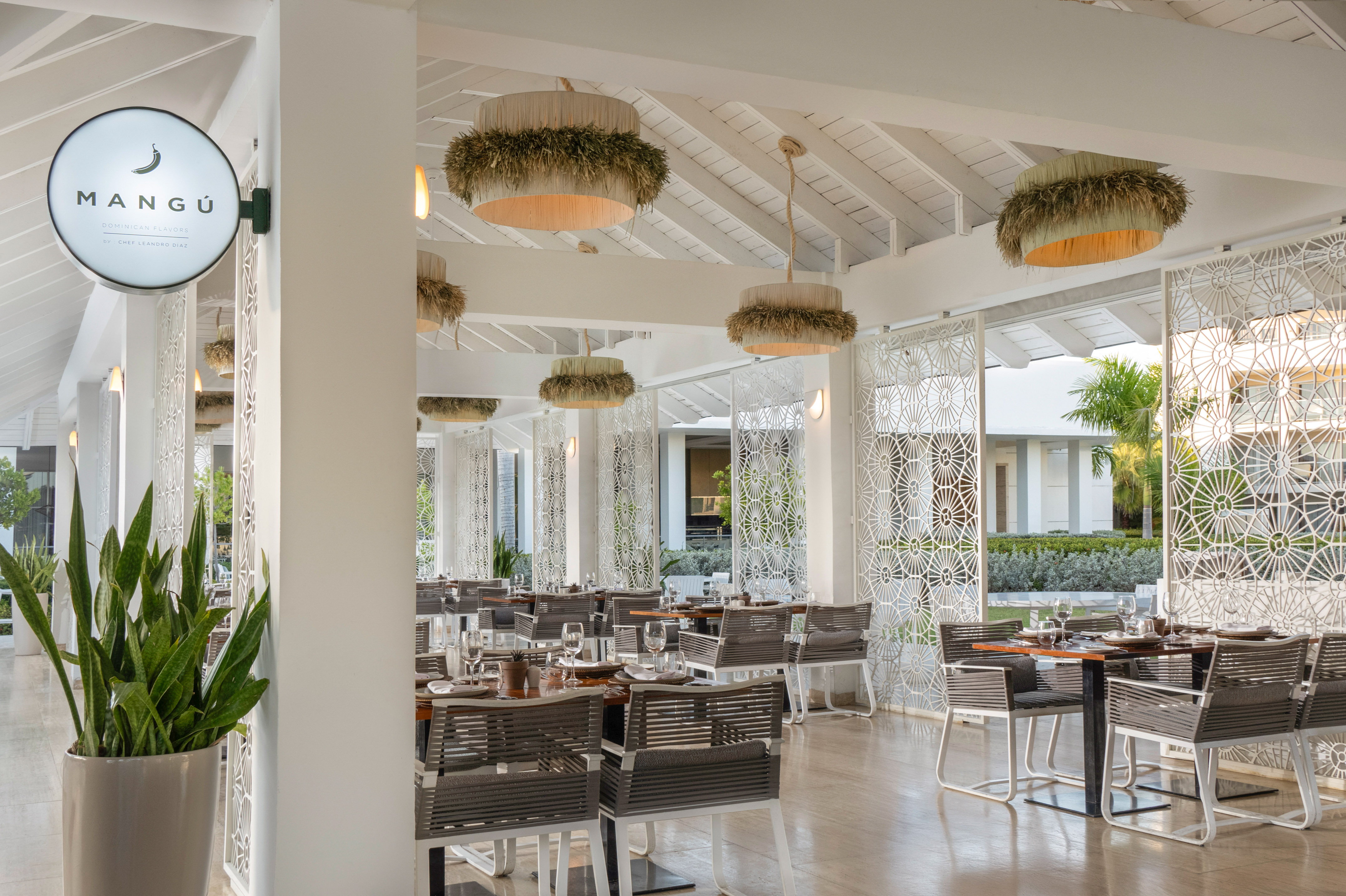 a restaurant with tables and chairs