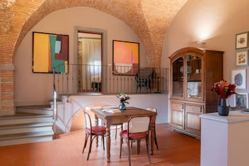 a room with a table and chairs