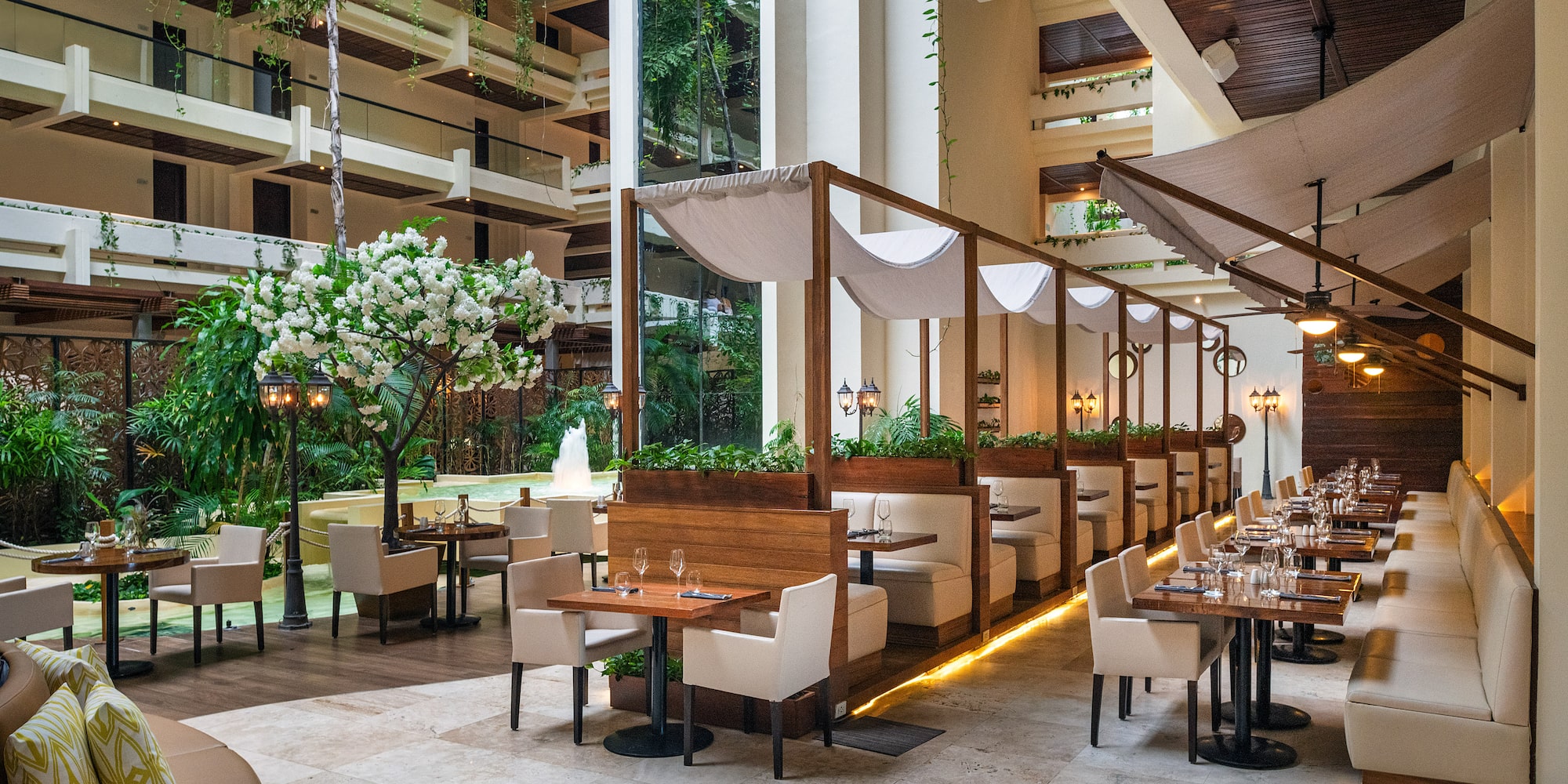 a restaurant with tables and chairs