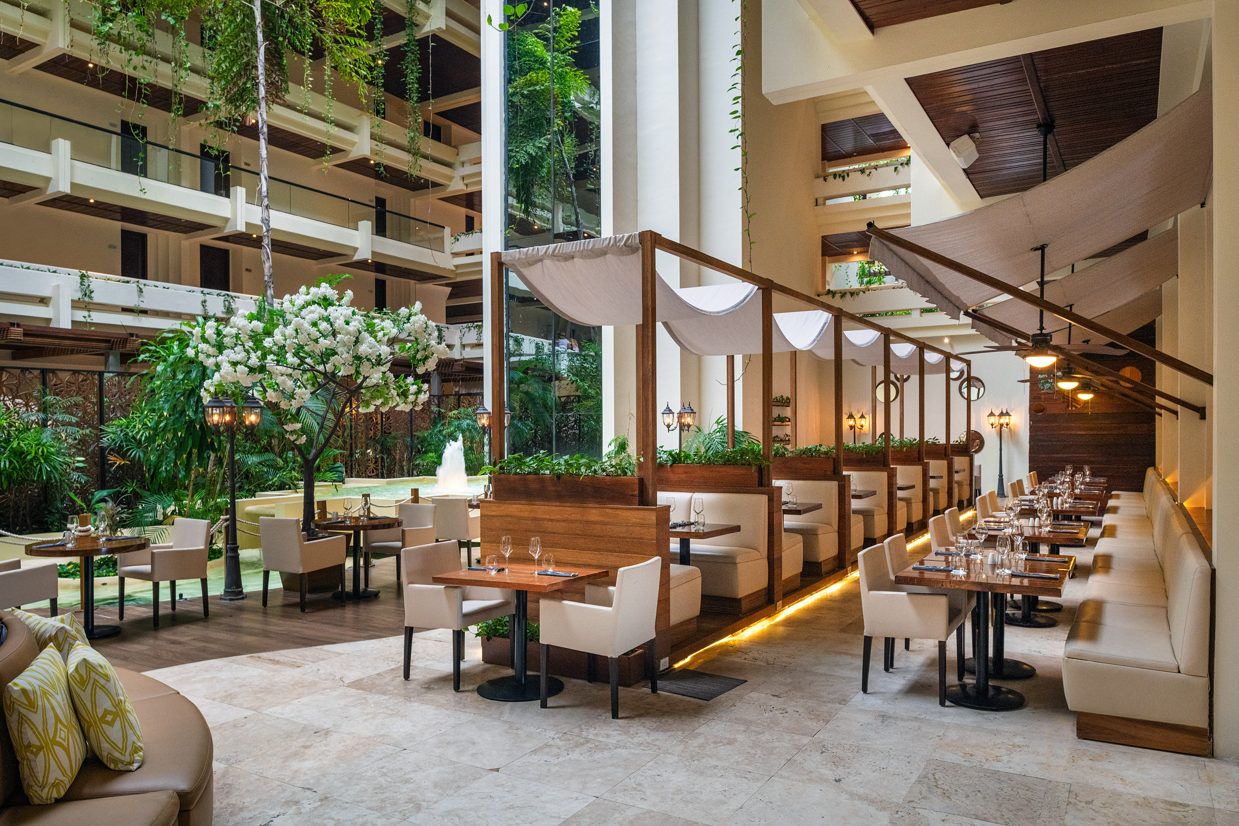 a restaurant with tables and chairs
