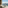 Hotel room with ocean view balcony, chairs, table, and Benidorm Island.