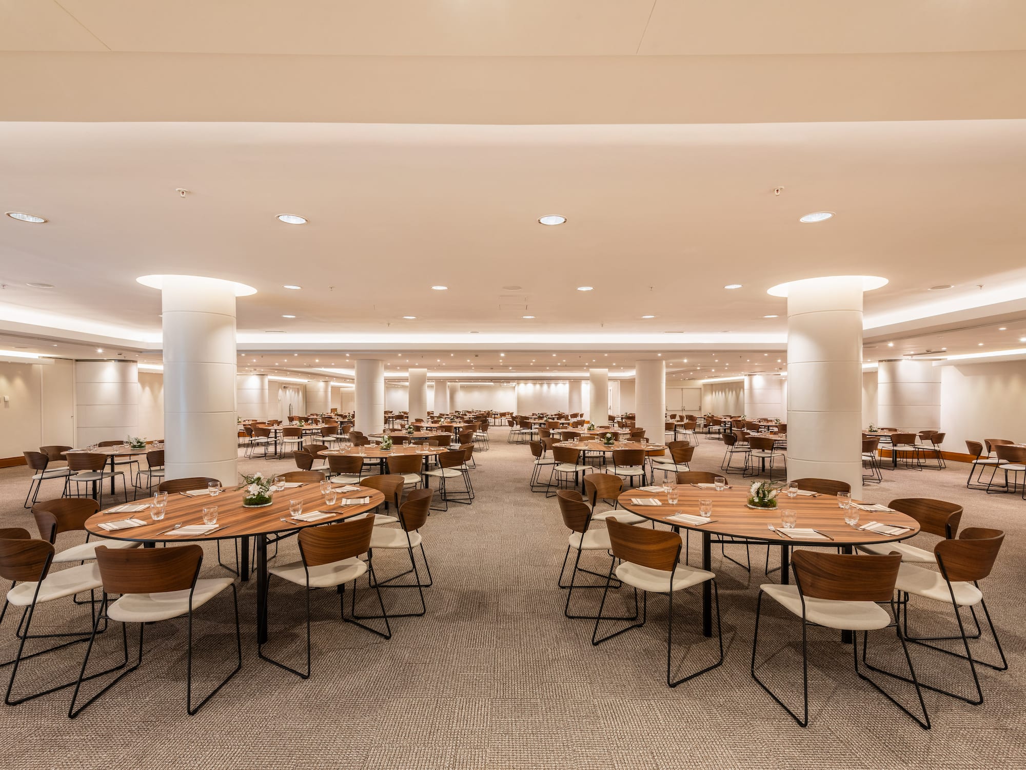 a large room with tables and chairs