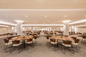 a large room with tables and chairs