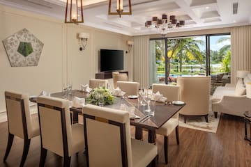a room with a table and chairs