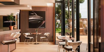 a room with tables and chairs