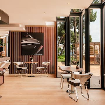 a room with tables and chairs