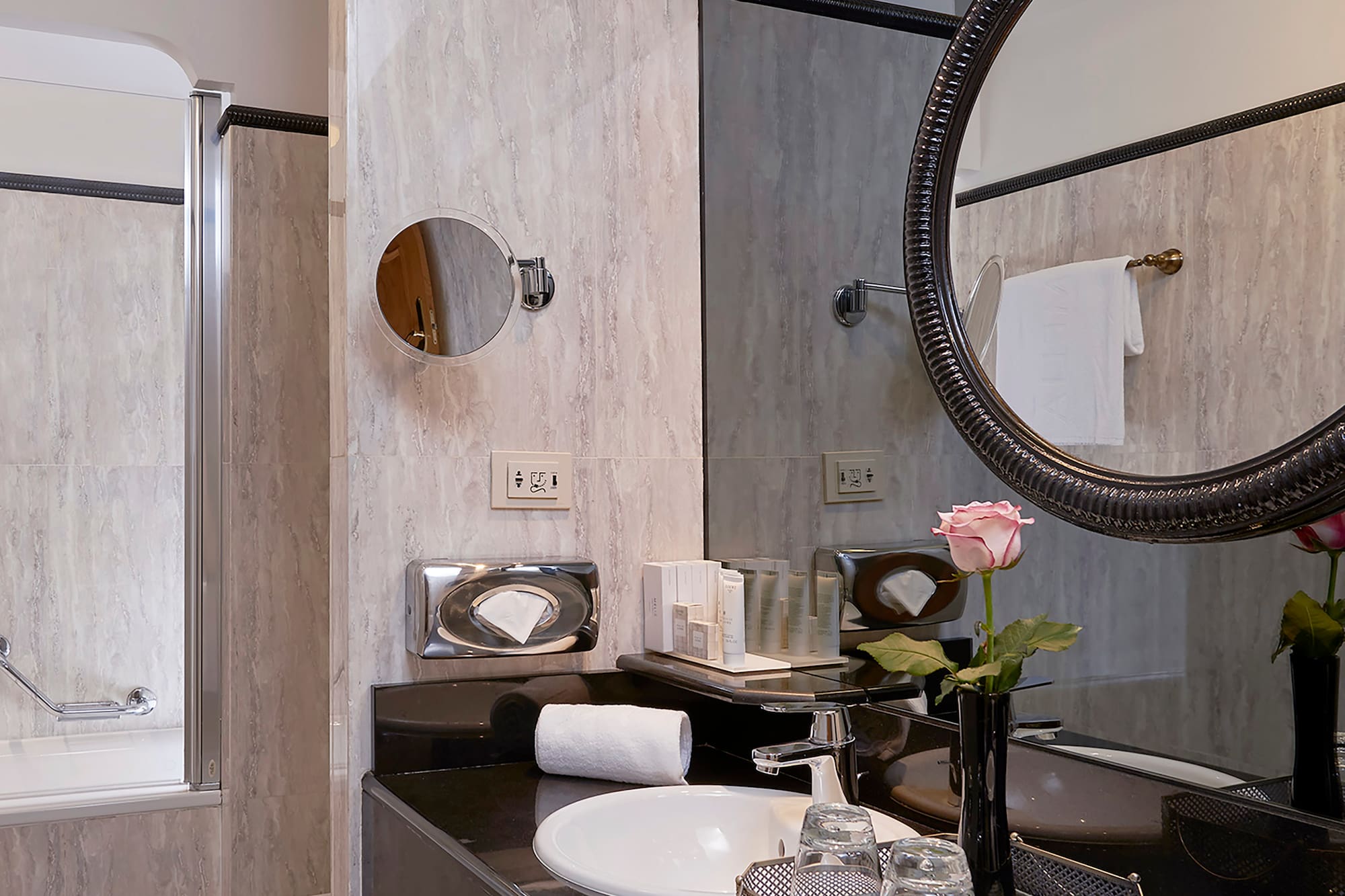 a bathroom with a mirror and sink