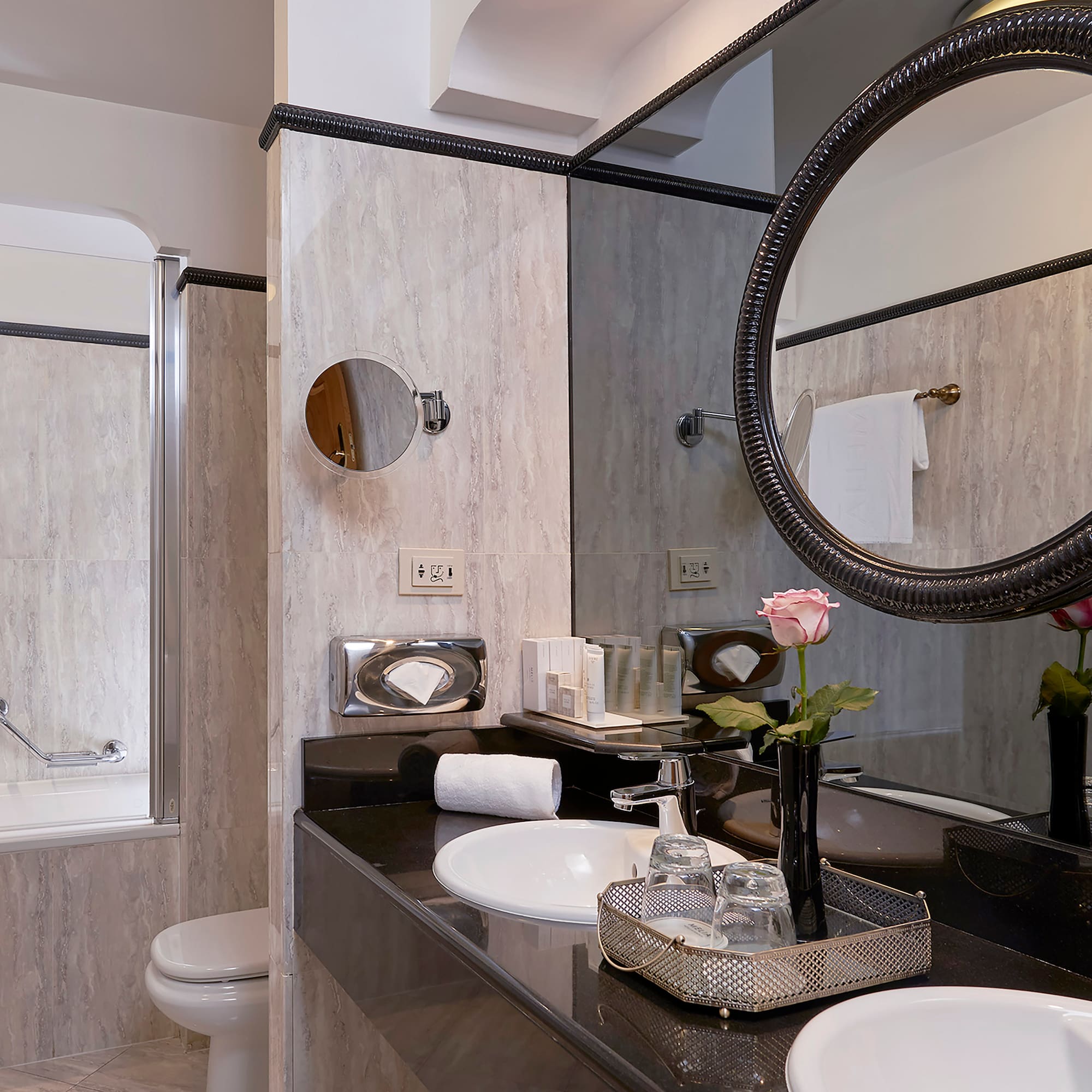 a bathroom with a mirror and sink