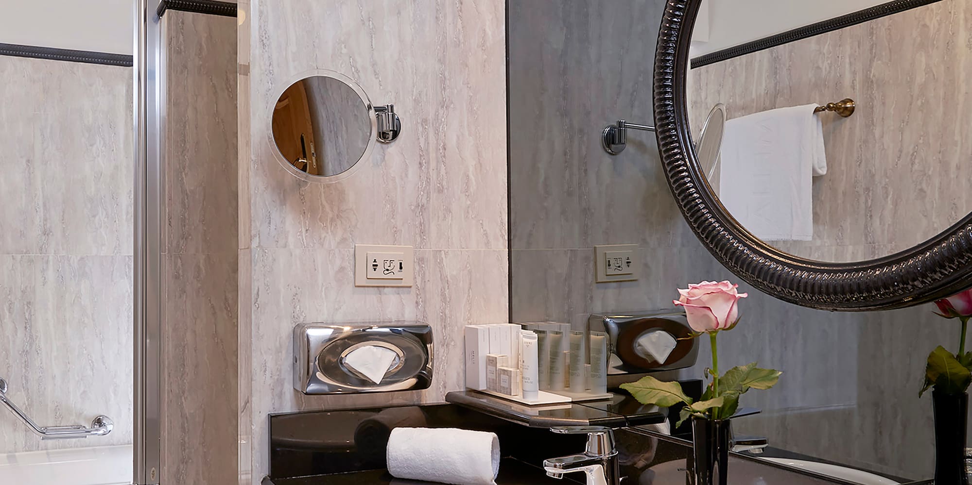 a bathroom with a mirror and sink