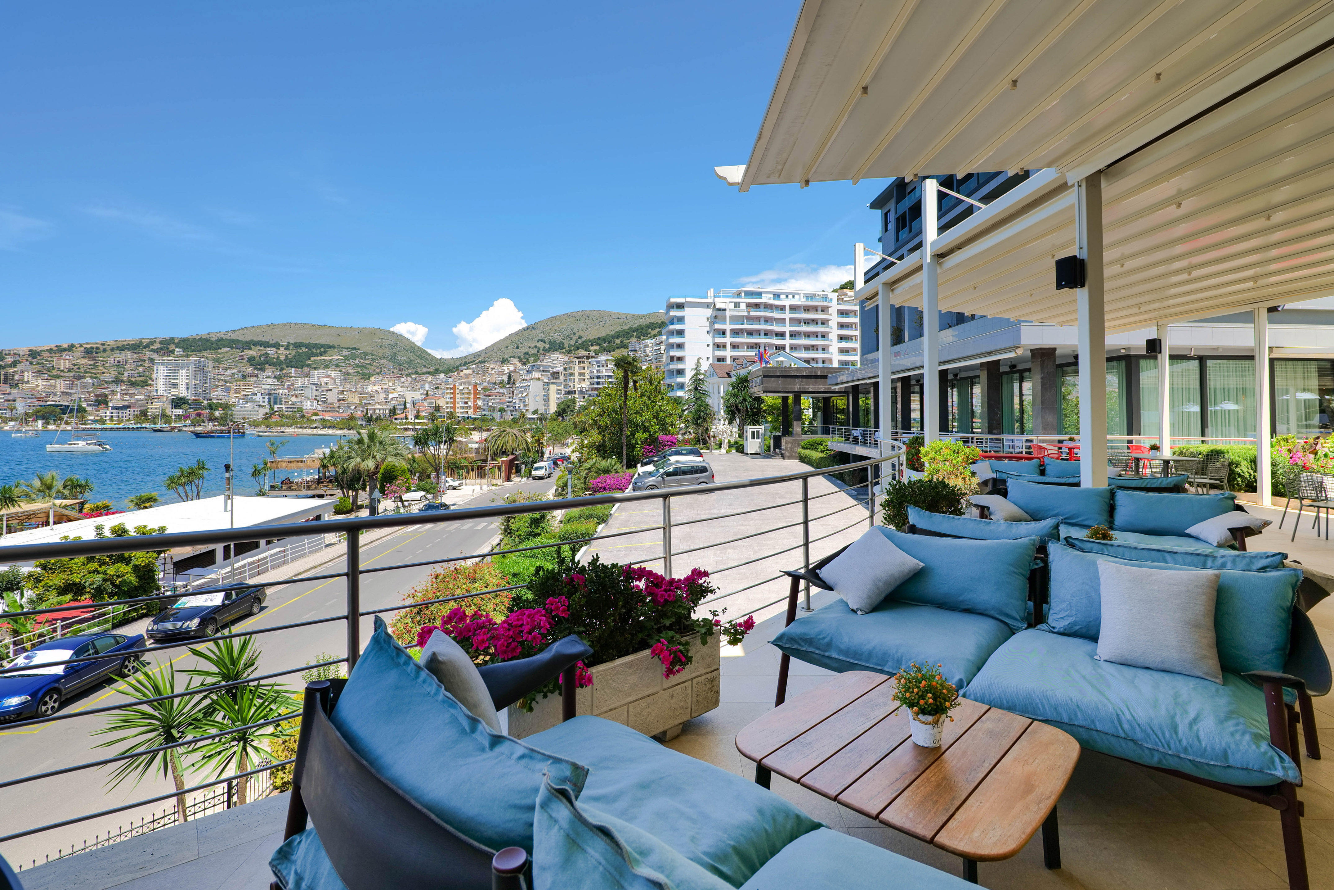 a patio with a view of the city and a road
