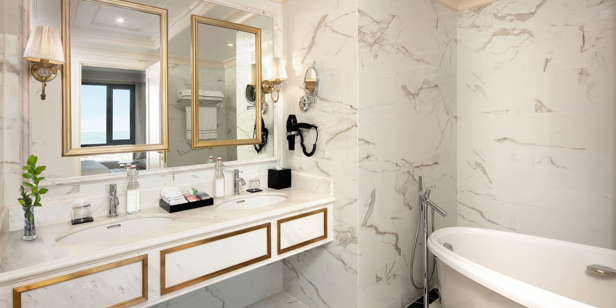 a bathroom with a tub and a mirror