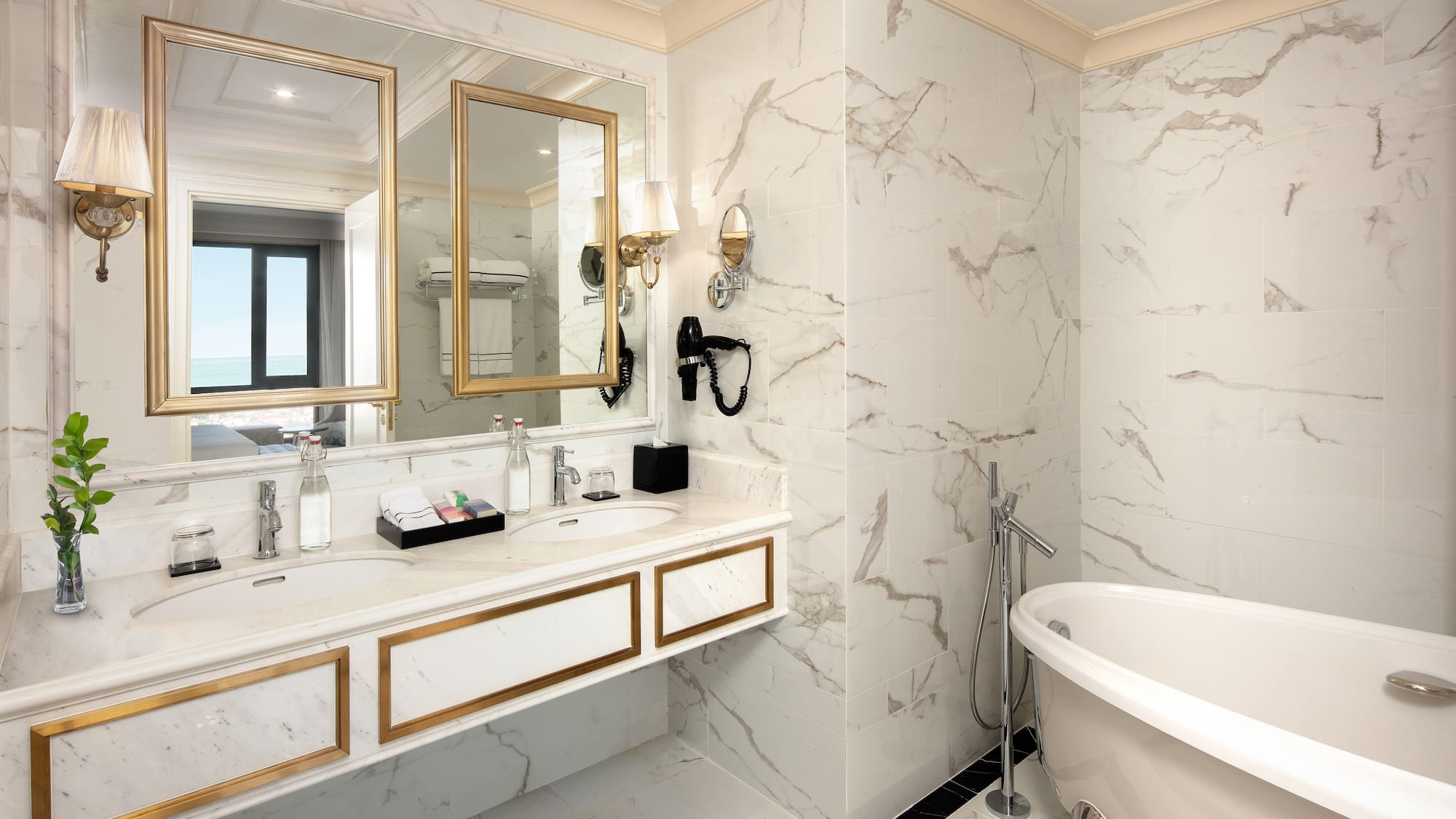 a bathroom with a tub and a mirror