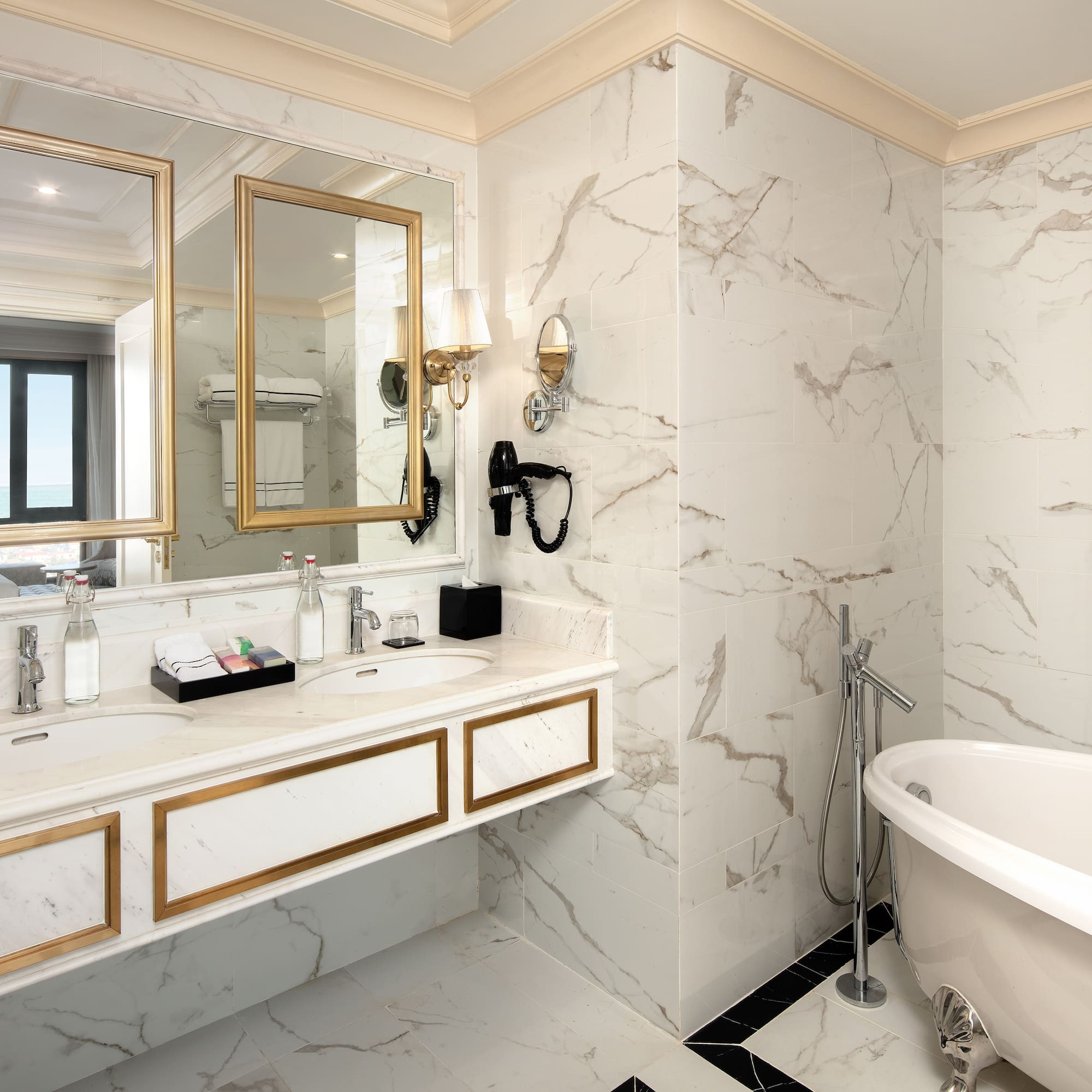 a bathroom with a tub and a mirror