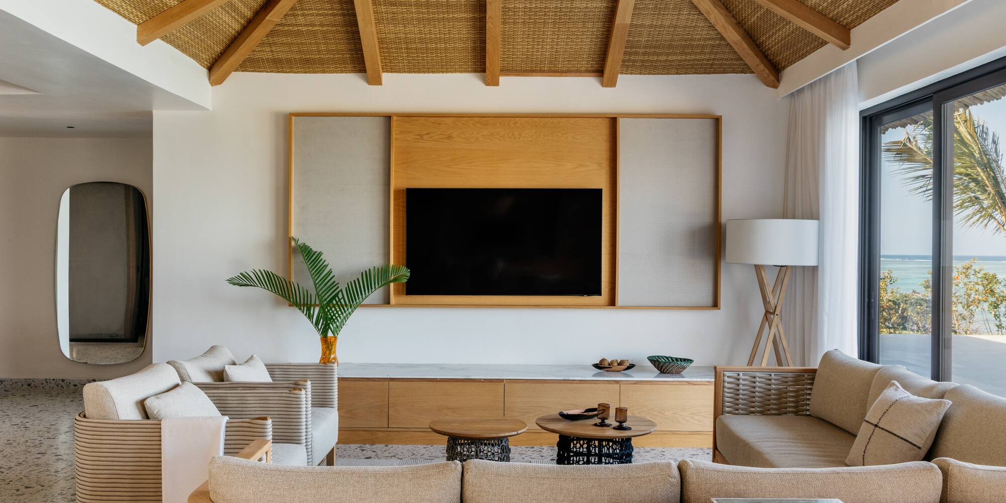 a living room with a television and a couch