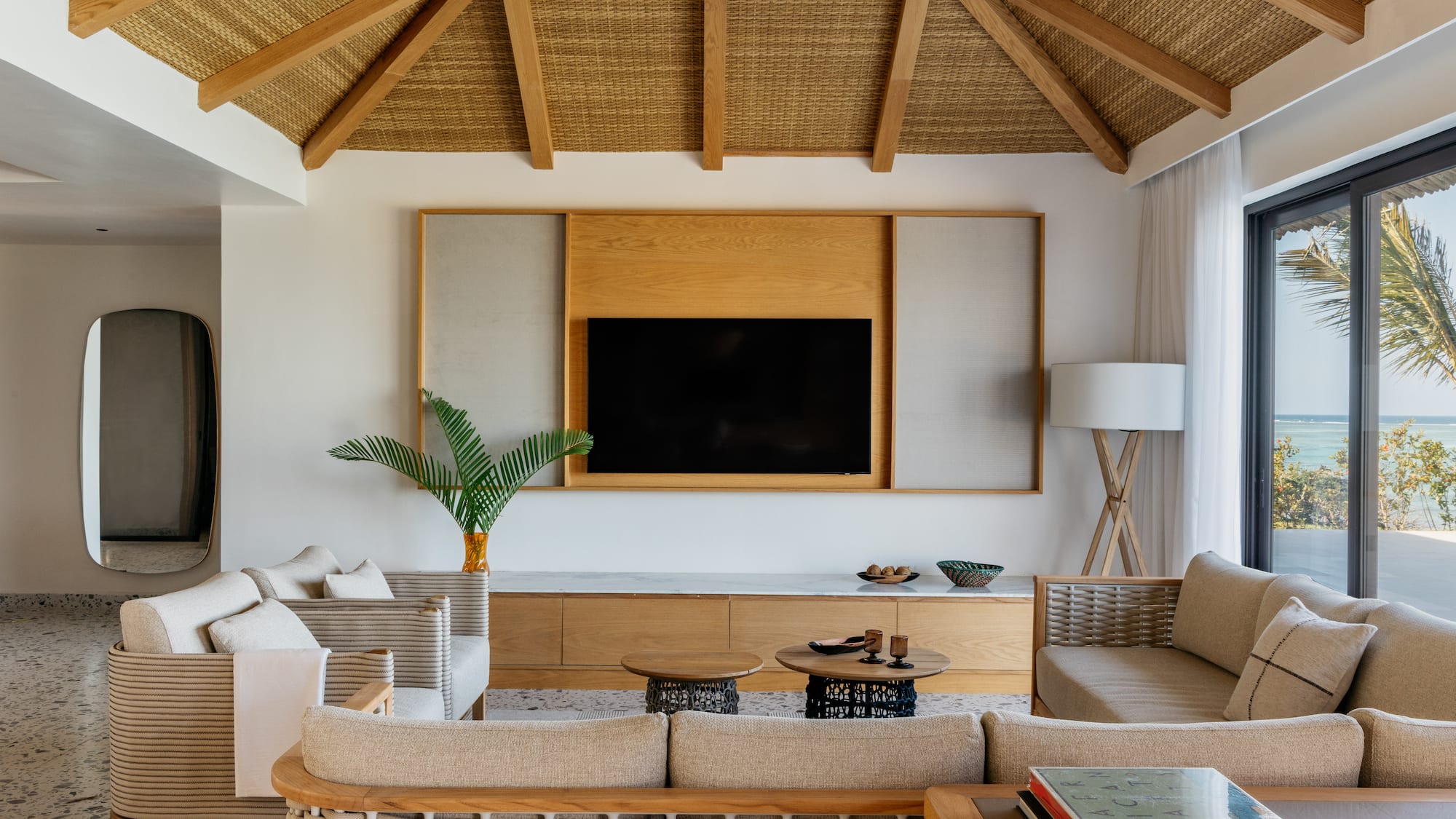 a living room with a television and a couch