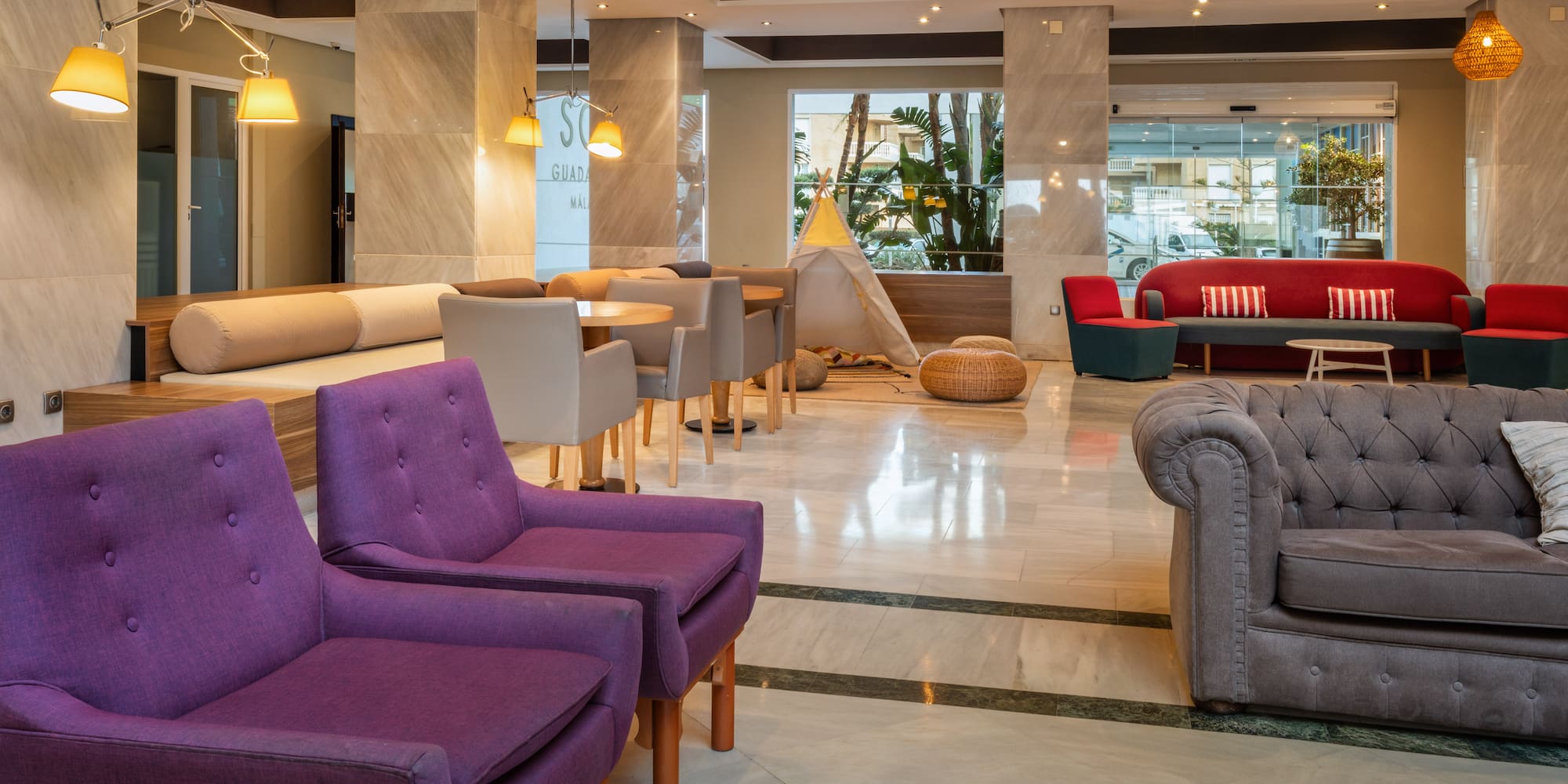 a room with chairs and tables