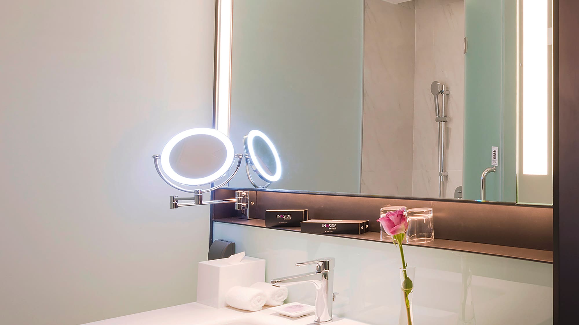 a bathroom with a mirror and sink