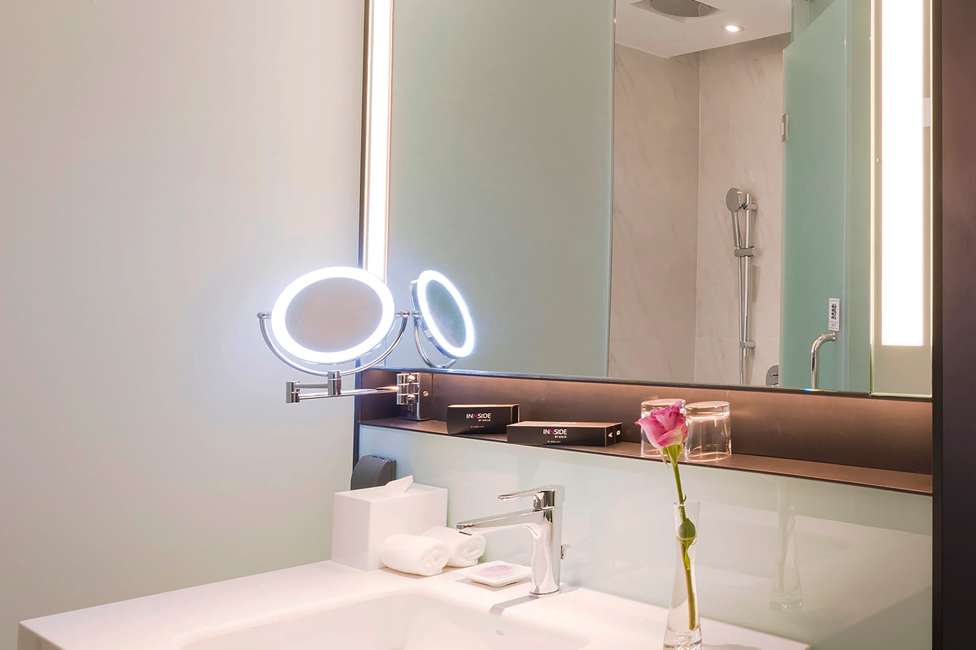 a bathroom with a mirror and sink