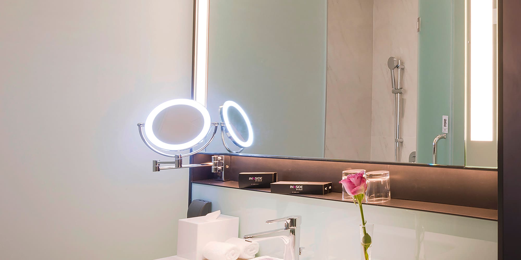 a bathroom with a mirror and sink