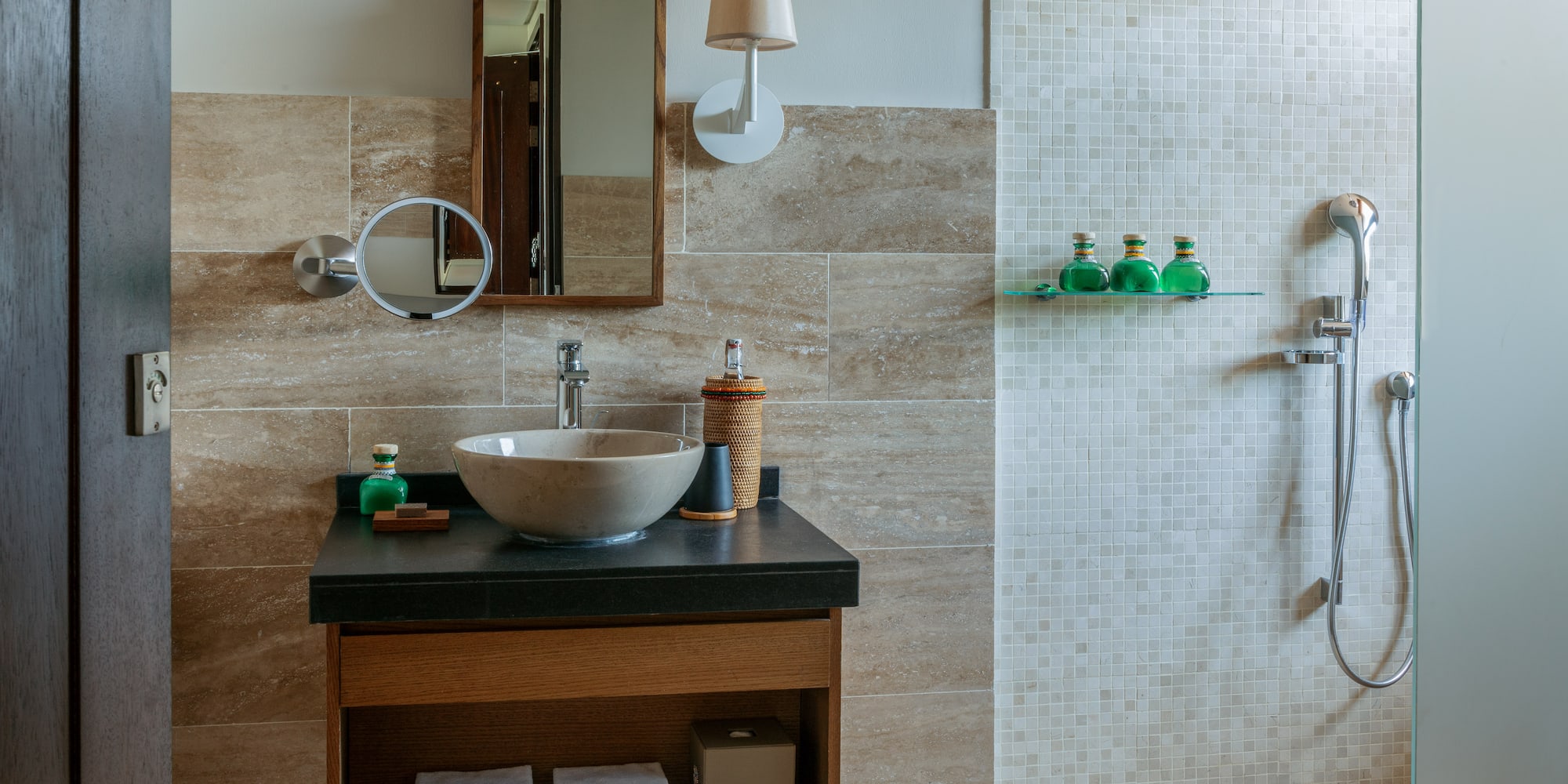 a bathroom with a sink and shower