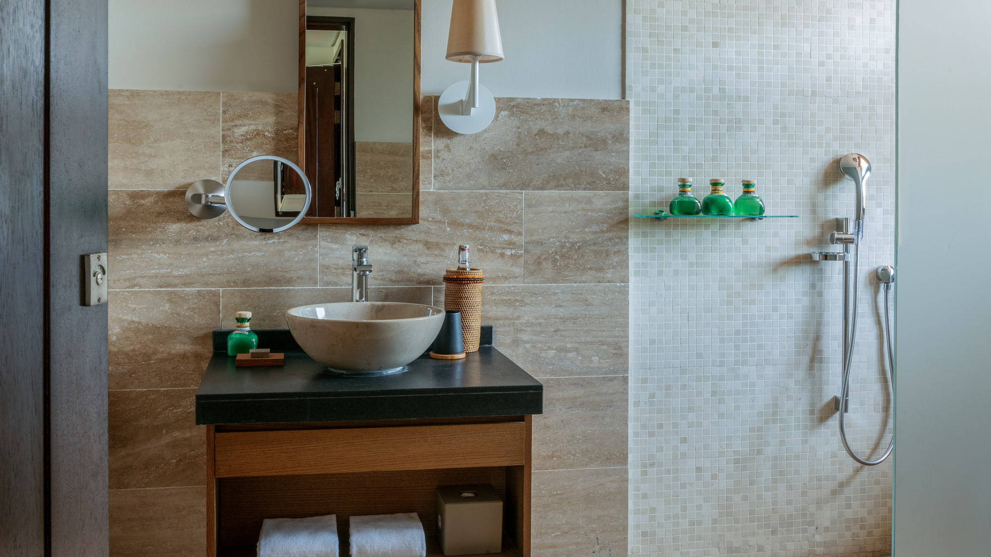 a bathroom with a sink and shower