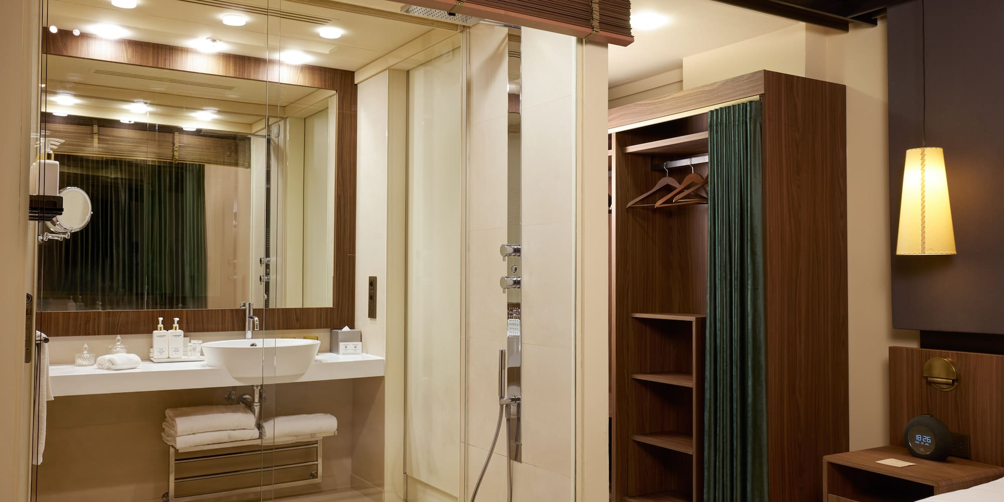 a bathroom with a glass shower door