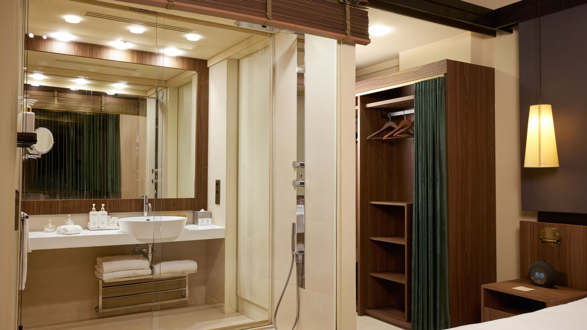 a bathroom with a glass shower door