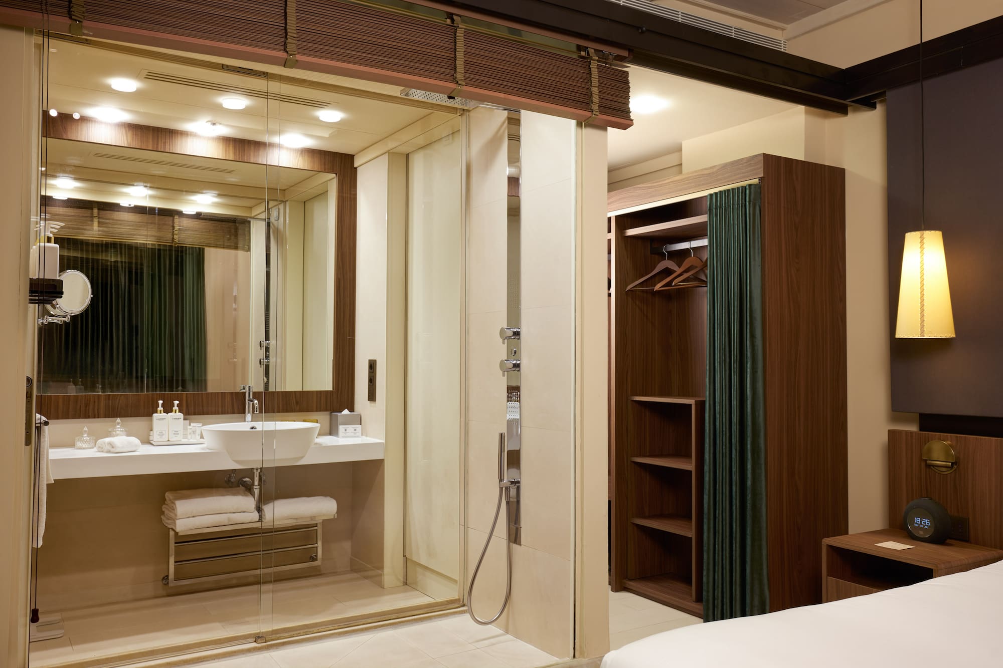 a bathroom with a glass shower door