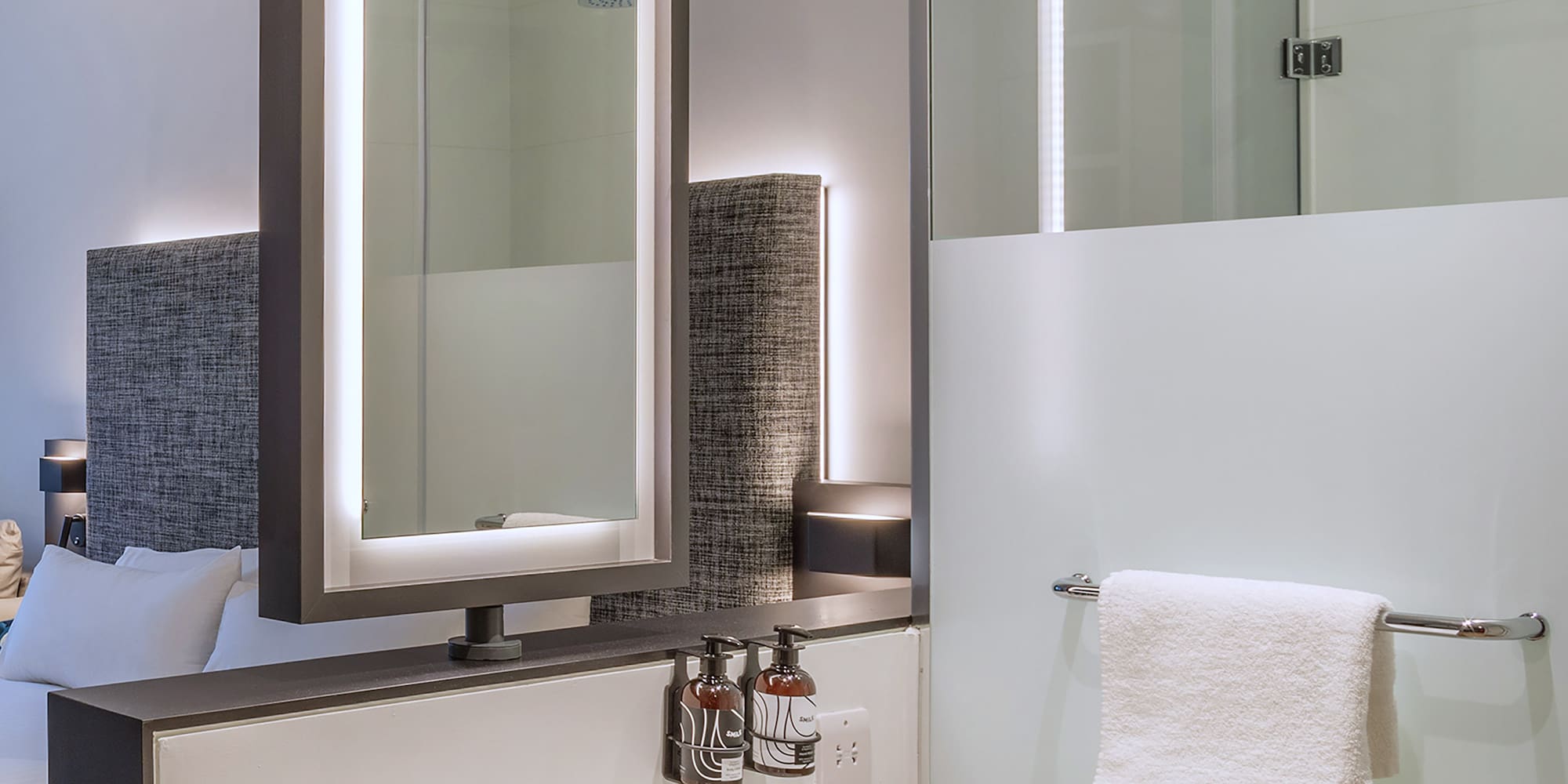 a bathroom with a mirror and sink