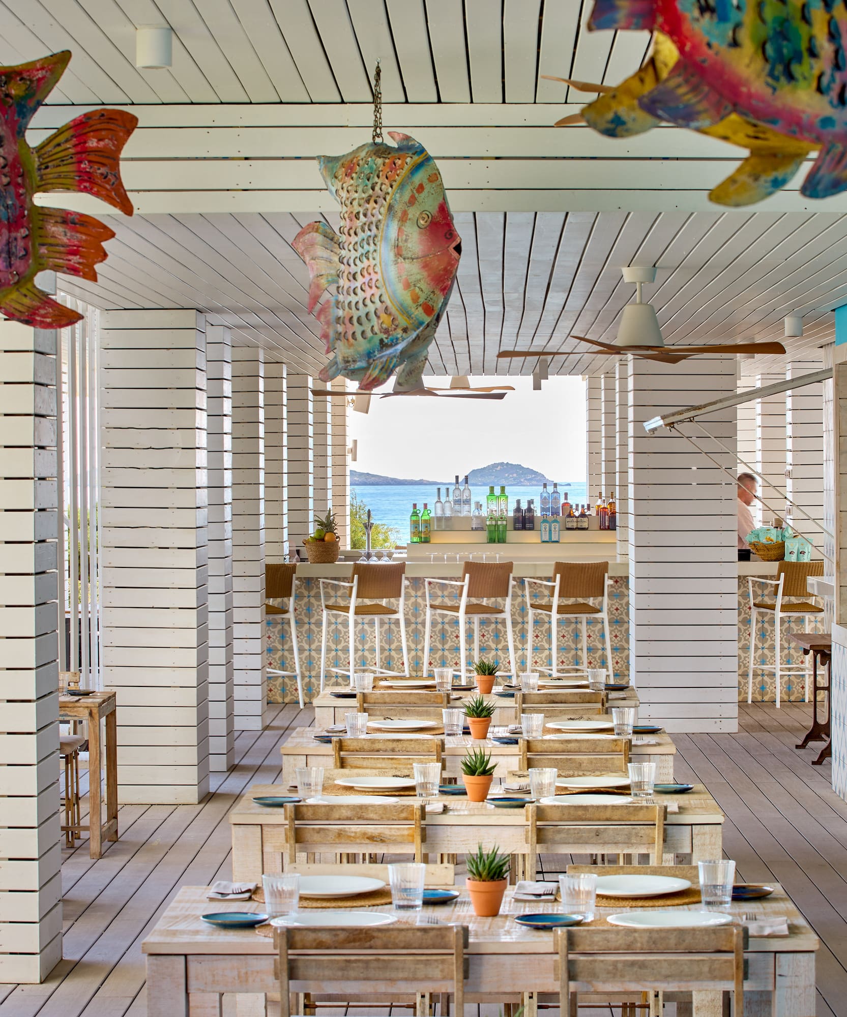 a restaurant with tables and chairs