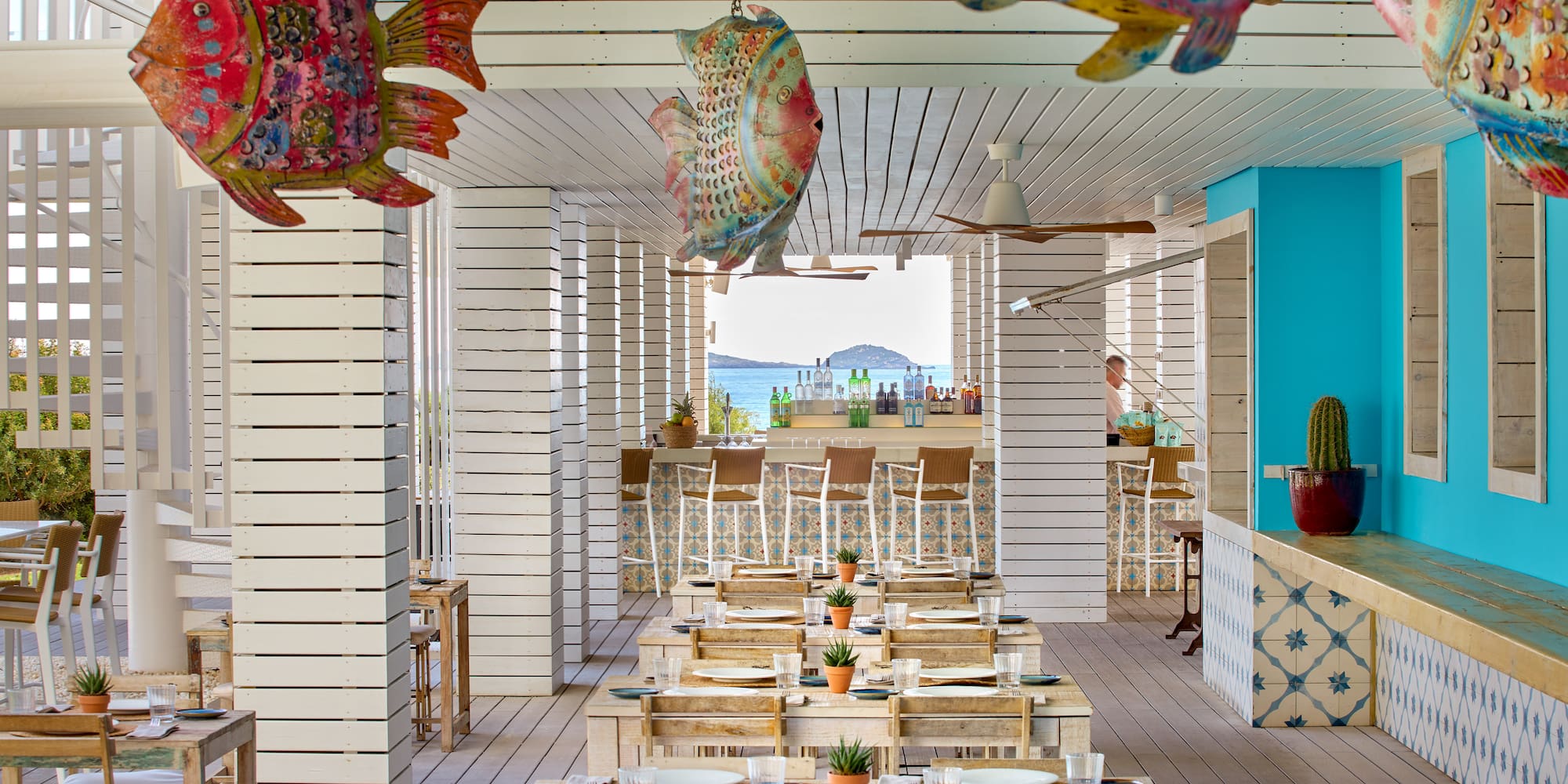 a restaurant with tables and chairs