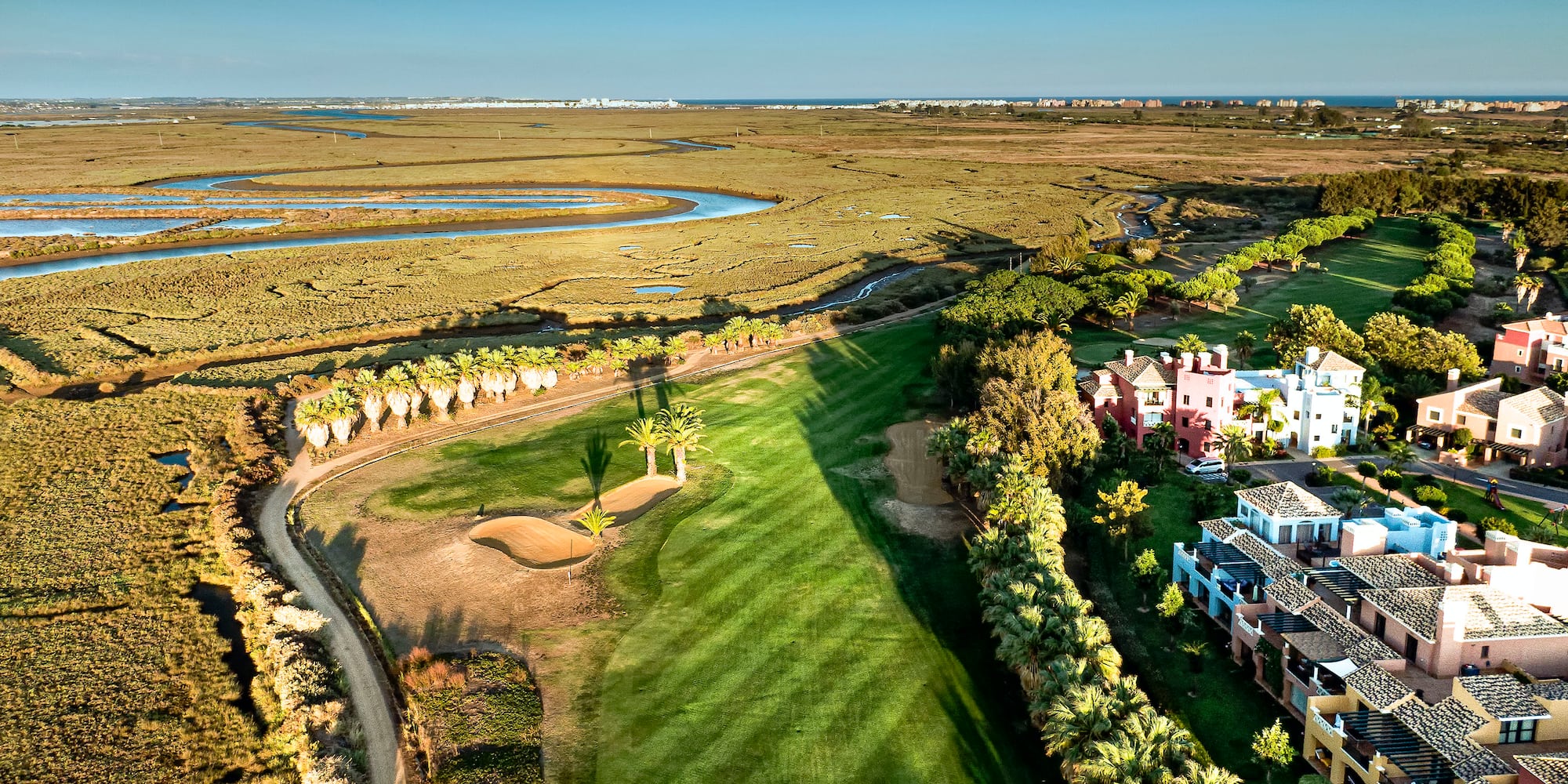 a golf course with a golf course and a golf course