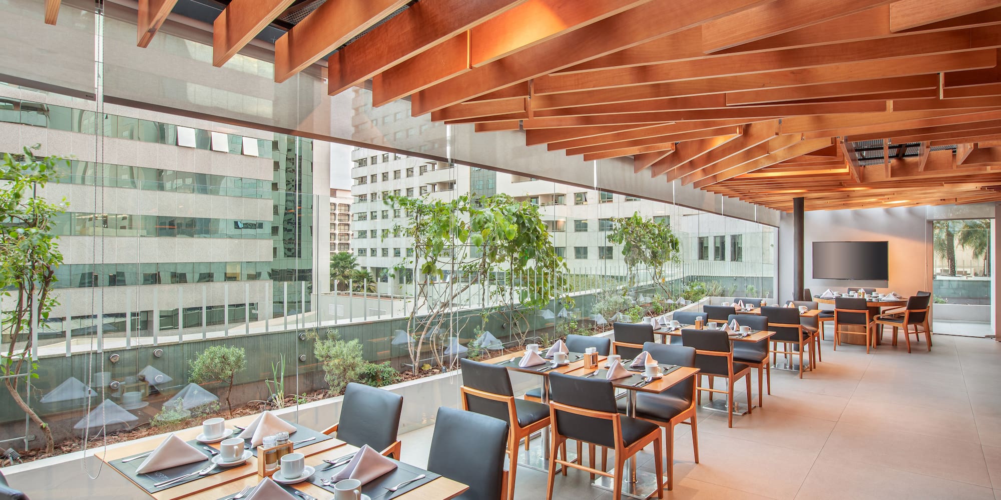 a restaurant with tables and chairs